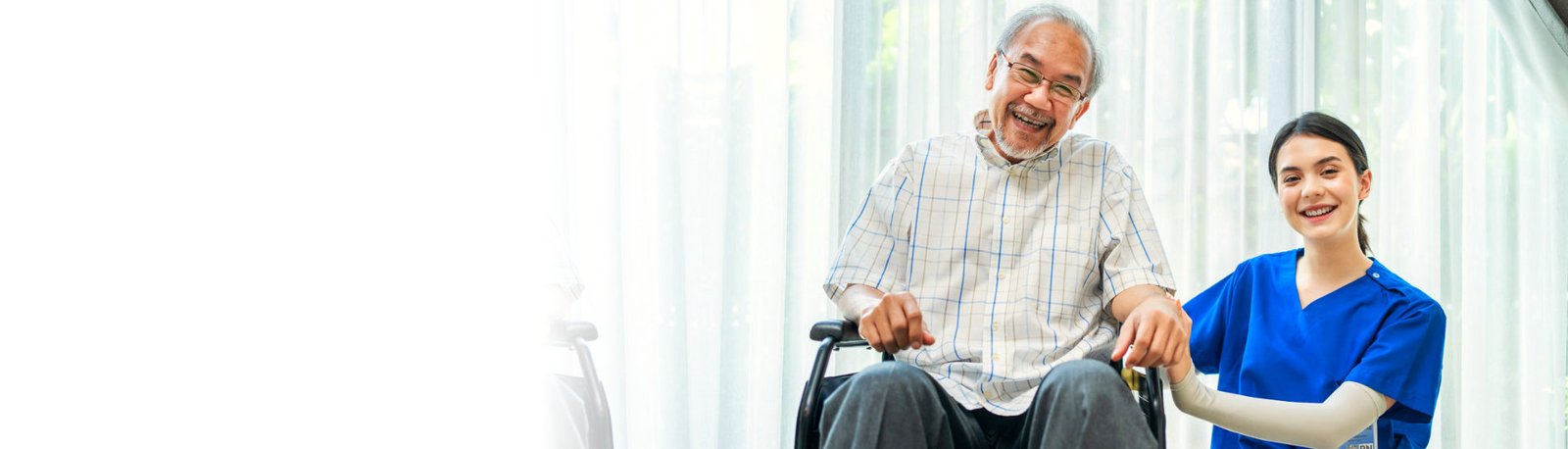 caregiver smiling with her patient